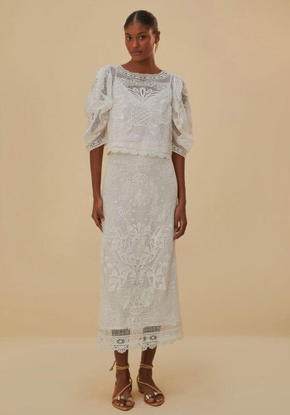 White Guipure Midi Skirt by Farm Rio, featuring a model wearing a stylish embroidered lace top and skirt combination.
