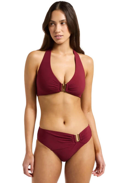 Jetset DD Halter Bikini Burgundy by Jets Swimwear, model wearing burgundy bikini top and matching bottoms.