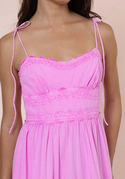 Poplin Hi-Low Dress Hibiscus by Juliet Dunn featuring a sweetheart neckline and adjustable spaghetti straps in vibrant pink.