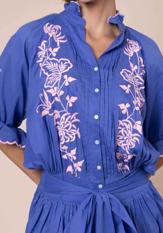 Butterfly Blouson Dress Denim by Juliet Dunn featuring pink butterfly embroidery, button down front, and scalloped edging.