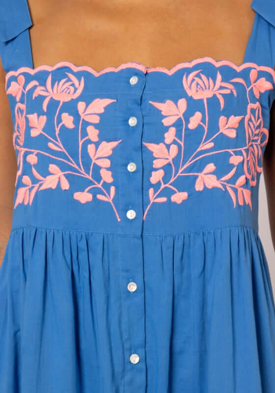 Butterfly Embroidery Shoulder Tie Dress Marine by Juliet Dunn, featuring vibrant watermelon embroidery on a bright marine fabric.