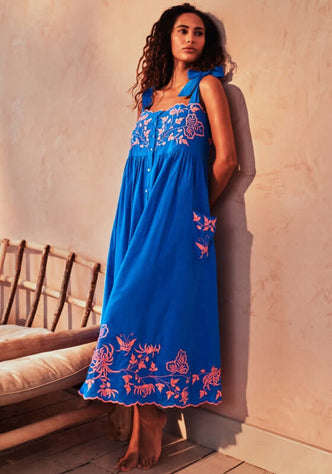 Butterfly Embroidery Shoulder Tie Dress Marine by Juliet Dunn, showcasing a vibrant blue sundress with butterfly embroidery.