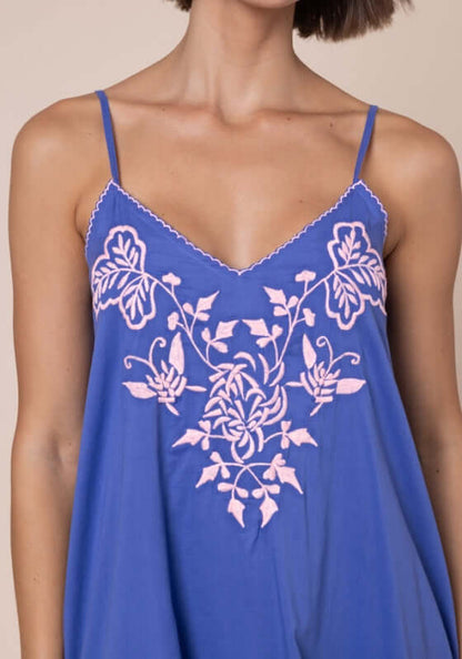 Butterfly Slip Dress Denim Candy by Juliet Dunn, featuring pink butterfly embroidery on a blue dress with spaghetti straps.