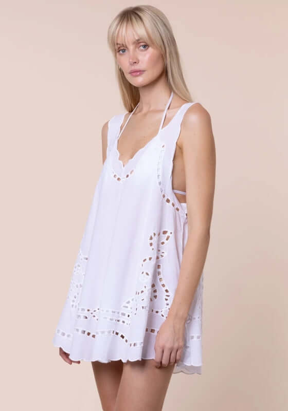 Cutwork Low Back Dress White by Juliet Dunn, showcasing a lightweight white dress with scalloped trim, ideal for poolside.
