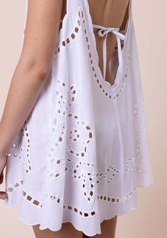 Cutwork Low Back Dress White by Juliet Dunn, showcasing the back detail and scalloped trim of the elegant white cotton dress.