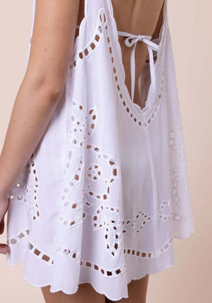 Cutwork Low Back Dress White by Juliet Dunn, showcasing the back detail and scalloped trim of the elegant white cotton dress.