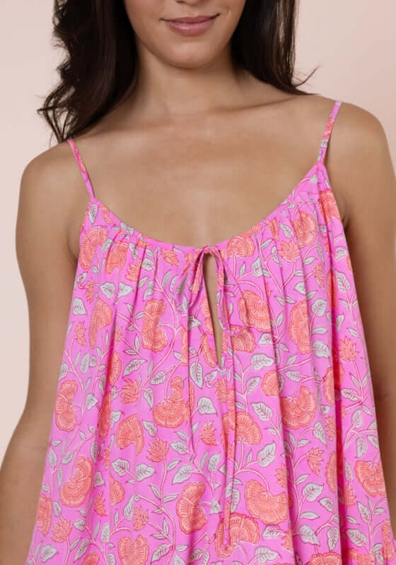 Floral Strappy Mini Dress Fuchsia by Juliet Dunn featuring a vibrant floral print and stylish spaghetti straps.