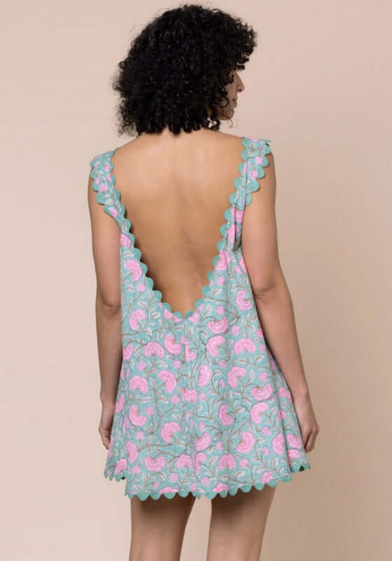 Gingko Low Back Dress Cactus by Juliet Dunn, showcasing a low back and scalloped hem in vibrant cactus pink and green floral print.