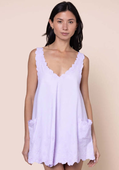Poplin Floral Low Back Dress Lilac by Juliet Dunn, showcasing a lilac dress with a low back and patch pockets.