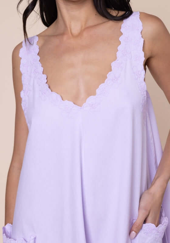 Poplin Floral Low Back Dress Lilac by Juliet Dunn, lilac dress featuring a deep v-neck and playful scalloped edges.