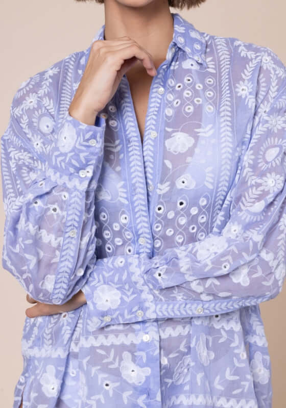 Mexican Embroidered Shirt Hydrangea by Juliet Dunn, featuring intricate patterns in soft hydrangea blue fabric.