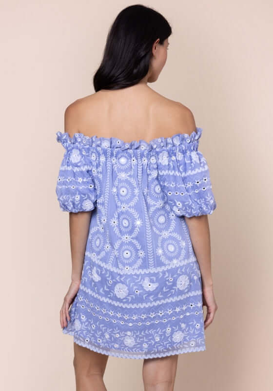 Mexican Embroidered Off Shoulder Dress Hydrangea by Juliet Dunn, showing the back view with puff sleeves and intricate embroidery.