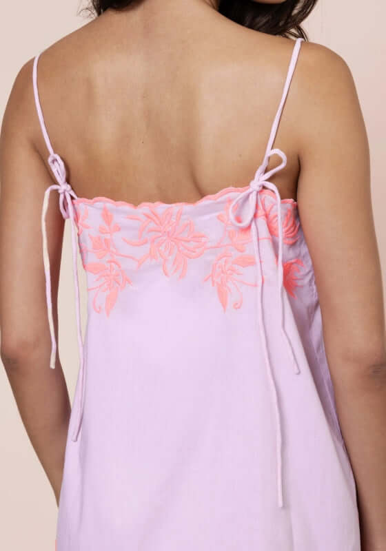 Butterfly Tie Strap Mini Dress Petal Pink by Juliet Dunn showing delicate embroidered back with tie straps.