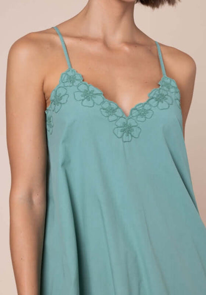 Poplin Midi Dress Cactus by Juliet Dunn close-up of floral embroidery on V-neckline and spaghetti straps.