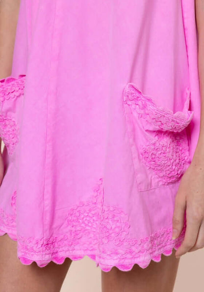 Poplin Low Back Dress Hibiscus by Juliet Dunn featuring playful patch pockets and scalloped hem in vibrant pink.