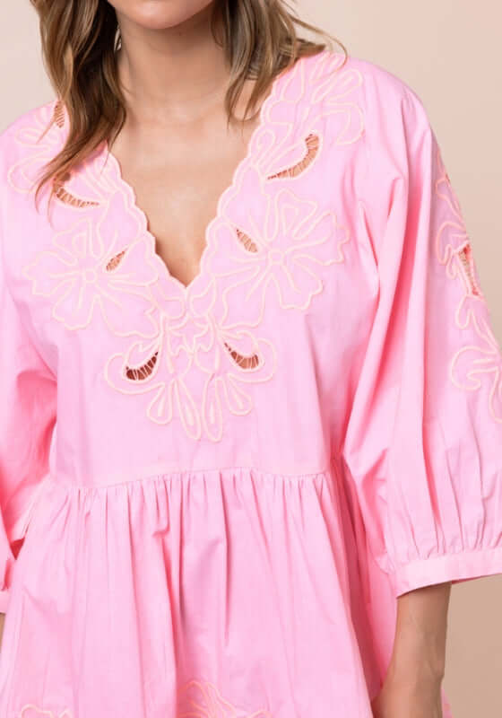 Poplin Tiered Mini Dress Paloma by Juliet Dunn featuring a V-neckline and puffy sleeves in light pink.