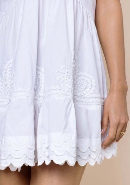 Poplin V Neck Mini Dress White by Juliet Dunn showcasing delicate scalloped embroidery at the hem.