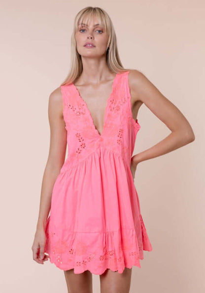 Poplin V Neck Mini Dress Watermelon by Juliet Dunn, model wearing a pink mini dress with scalloped hem and V neckline.