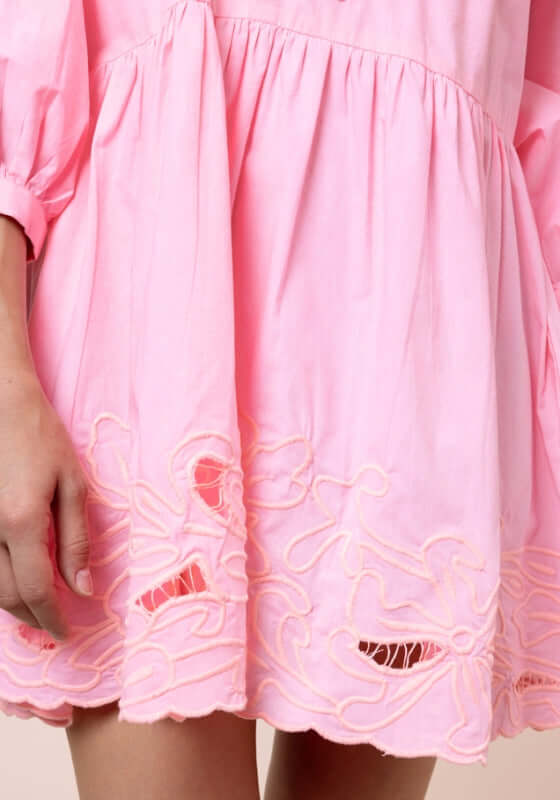 Poplin Tiered Mini Dress Paloma by Juliet Dunn, showcasing pink fabric with delicate scalloped hem and embroidery details.