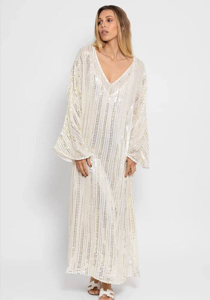 Leandra Dress Bora Bora by Sundress, featuring a v neckline, wide long sleeves, and intricate sequin patterns.