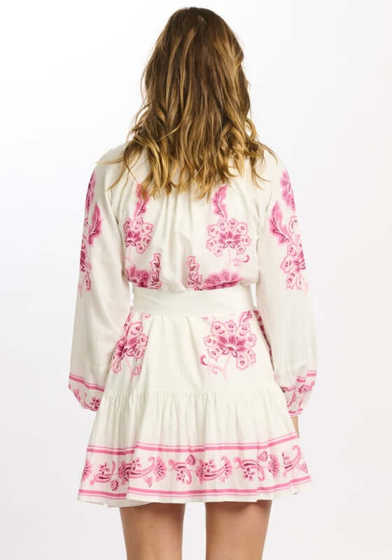 Anika Dress by Miss June, back view showcasing pink paisley print and tiered skirt detail.