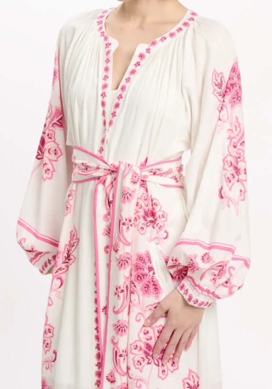 Dana Dress by Miss June featuring pink paisley print, V-neckline, elasticated balloon sleeves, and fabric belt.