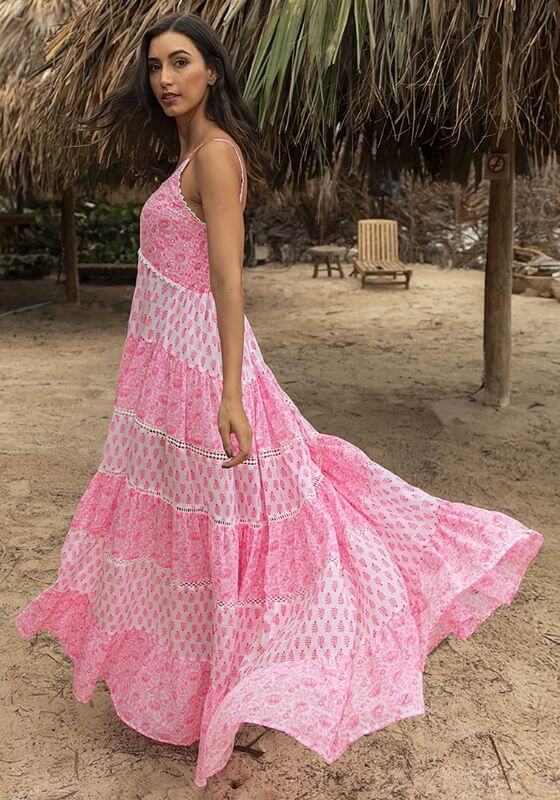 Davana Dress by Miss June, a vibrant neon pink tiered maxi dress with spaghetti straps and lace trim.