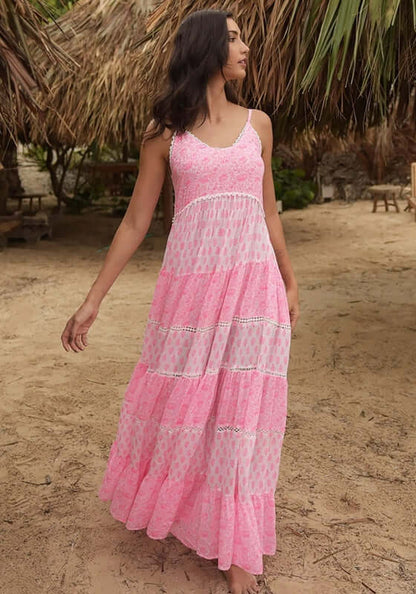 Davana Dress by Miss June, a vibrant pink tiered maxi dress with spaghetti straps and lace trim.