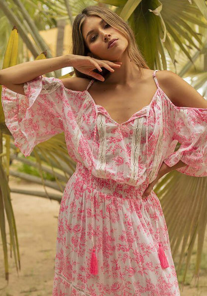 Karena Dress Pink by Miss June, featuring a floral off-the-shoulder design with lace inserts and tassel accents.