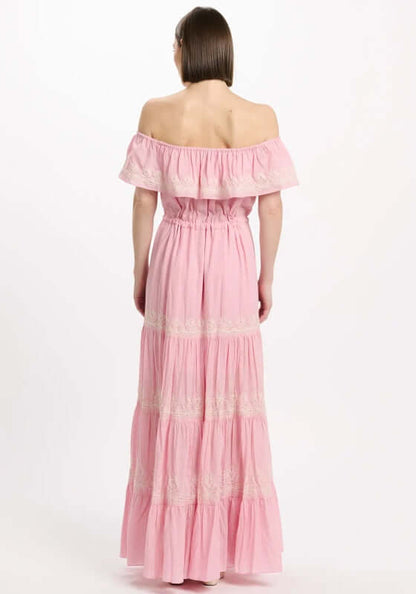 Malone Dress Pink by Miss June, showcasing the elegant off-shoulder back and tiered silhouette with white embroidery.