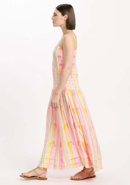 Perla Beach Dress by Miss June, featuring luminous neon stripes in pink, yellow, and white on a model.
