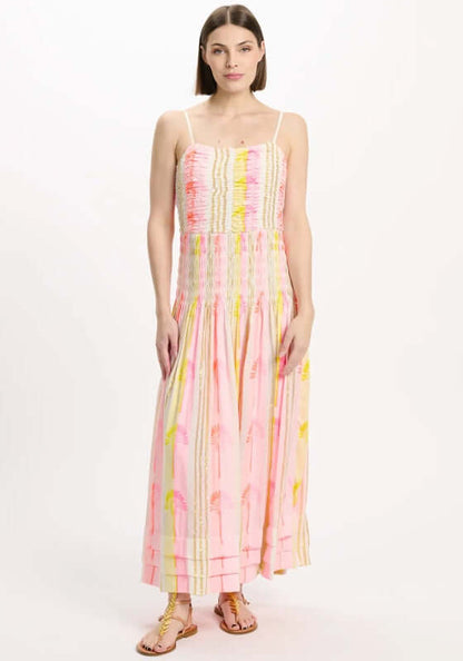 Perla Beach Dress by Miss June, a smocked dress with neon stripes and palm motifs, perfect for sunny getaways.