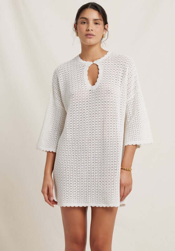 Pointelle Kaftan by Peony, a white kaftan with pointelle detailing and keyhole neckline on a model.