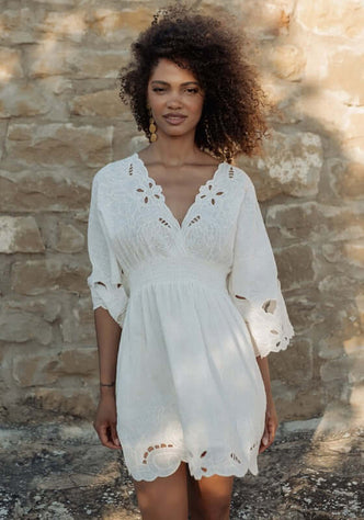 Rodhas Dress White by Piti Cuiti featuring a breezy design with V-neckline and delicate embroidery.