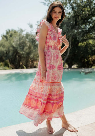 Sri Lanka Dress Pink by Piti Cuiti, a sleeveless beach dress with a frilly V-neckline, perfect for summer.