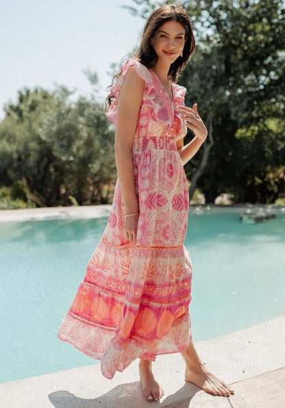 Sri Lanka Dress Pink by Piti Cuiti, a sleeveless beach dress with a frilly V-neckline, perfect for summer.