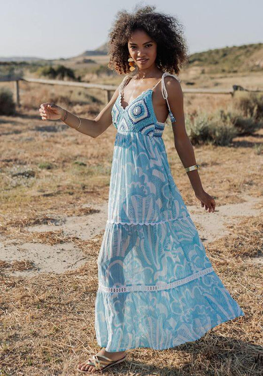 Shell Long Dress Blue by Piti Cuiti featuring a flowing tiered skirt and delicate crochet top in rich blue tones.