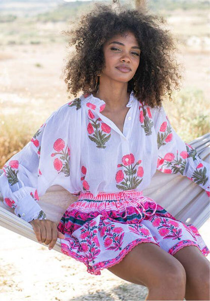 Zanzibar Shirt White Pink by Piti Cuiti, featuring floral print and frilly collar, perfect for beach style.