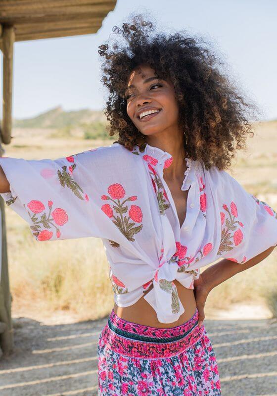 Zanzibar Shirt White Pink by Piti Cuiti, featuring a floral print and frilly collar, perfect for beachwear.