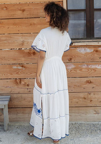 Tulum Long Dress Blue White by Piti Cuiti, showcasing the elegant back with embroidery detail and flowing fabric.