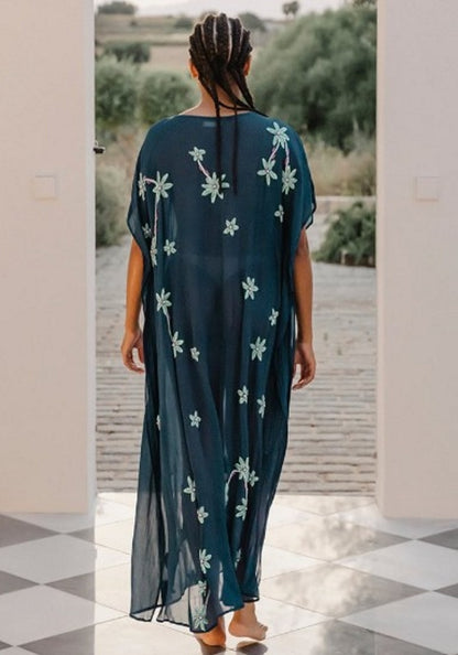 Cordelia Beaded Kaftan Navy by Pitusa features delicate beadwork and a flowing silhouette, perfect for elegant outings.