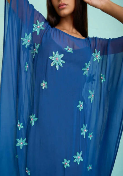 Cordelia Beaded Kaftan Navy by Pitusa featuring delicate beadwork and a flowing silhouette.