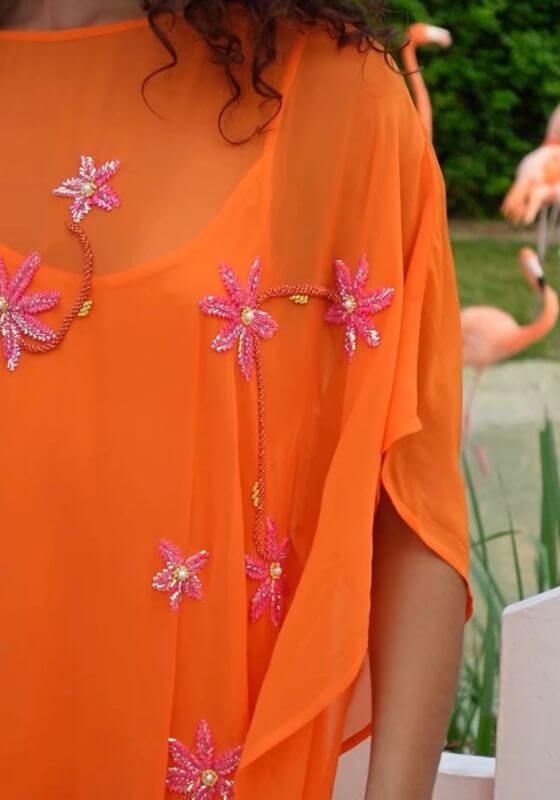 Cordelia Beaded Kaftan Orange by Pitusa featuring delicate beadwork and a flowing silhouette.