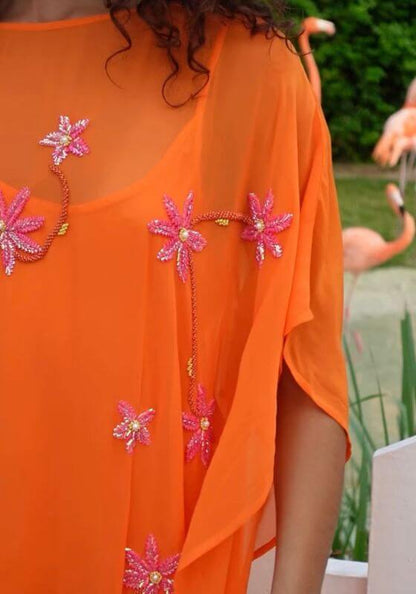 Cordelia Beaded Kaftan Orange by Pitusa featuring delicate beadwork and a flowing silhouette.