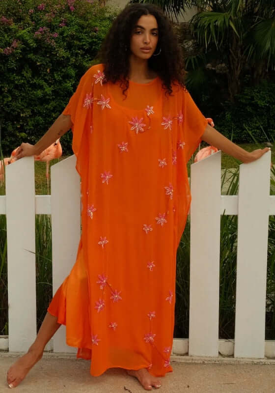 Cordelia Beaded Kaftan Orange by Pitusa featuring delicate beadwork and a flowing silhouette in a vibrant orange shade.