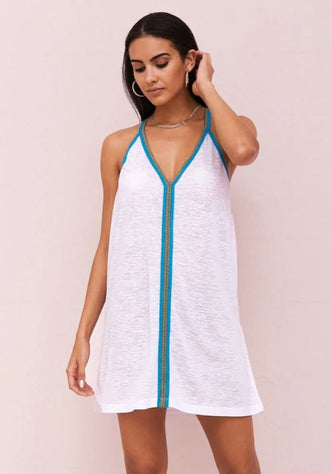 Inca Mini Dress White by Pitusa, featuring elegant embroidery and soft, semi-sheer fabric on model, perfect for summer.
