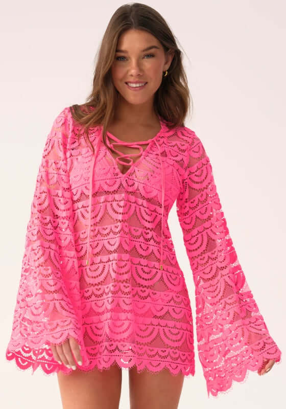 Tulip Noah Tunic by PQ Swim featuring a vibrant neon pink lace design with flowing bell sleeves.