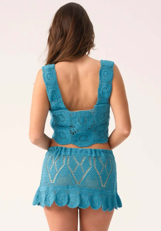 Saltwater Aria Top by PQ Swim, featuring a blue crochet design, perfect for a relaxed bohemian vibe.