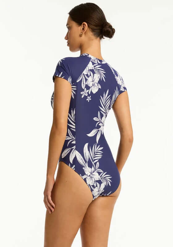 Aloha Short Sleeved Zip Front Swimsuit by Sea Level, featuring floral design and short sleeves, ideal for summer style.