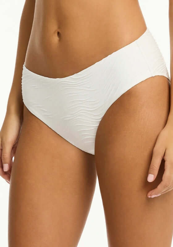 De Soleil Balconette Bikini White by Sea Level showing textured white bikini bottoms designed for comfort and style.